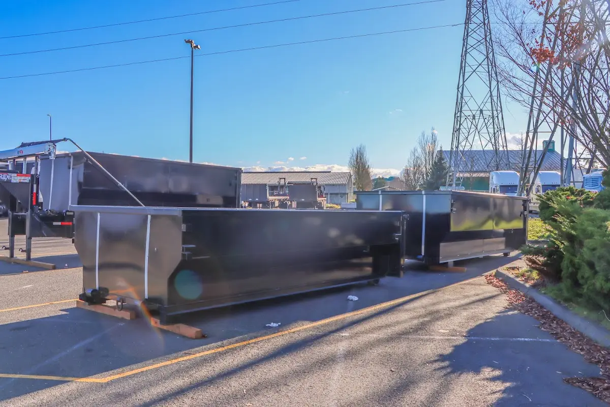 Roll-off dumpster ready for waste disposal at job site for 2 Yard Dumpster Rental in Camas